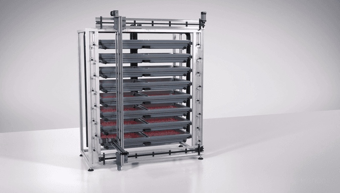 A hatchery with 8 trays and a robot tending system