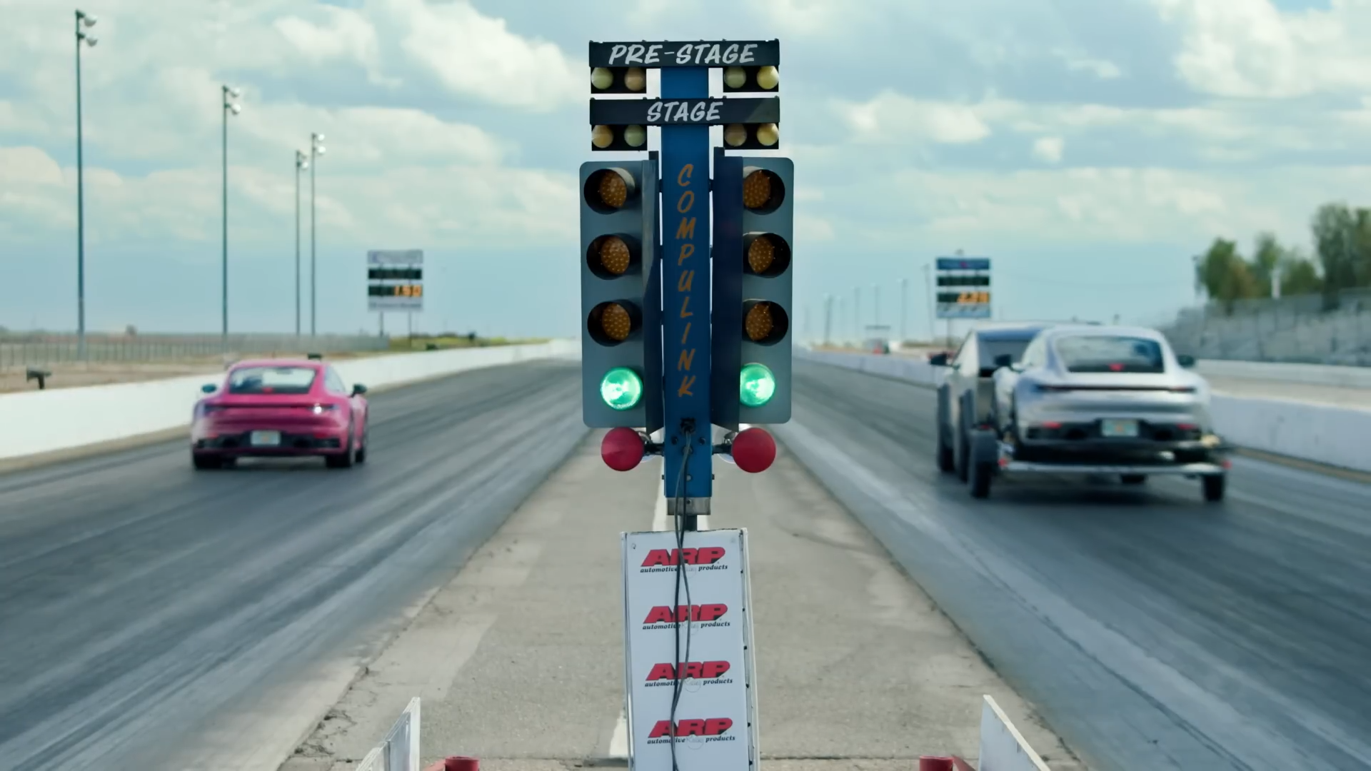 Porsche 911 vs Tesla Cybertruck towing a Porsche 911 on a Futura car Trailer