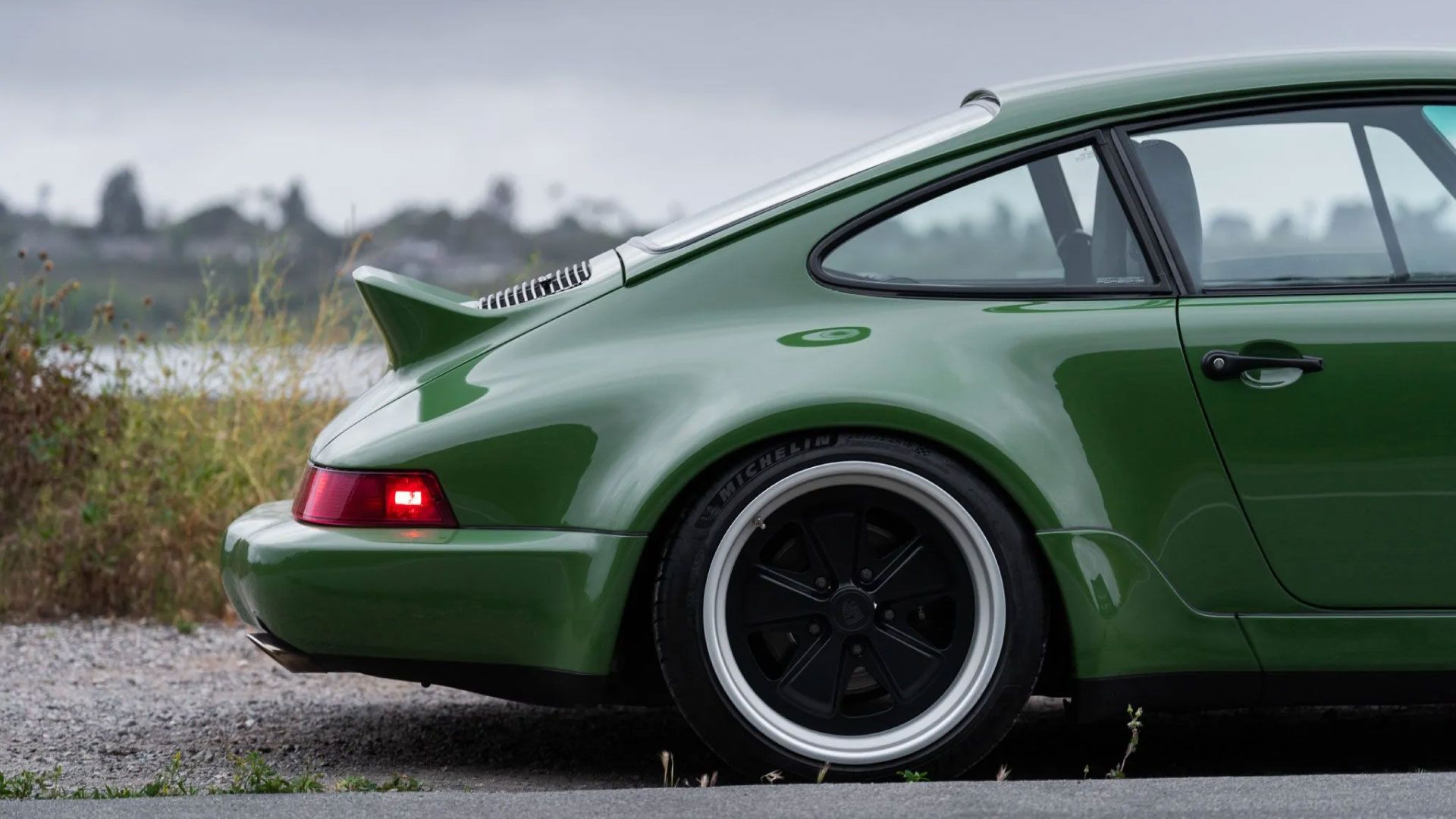Green Porsche 964 on Bring a Trailer