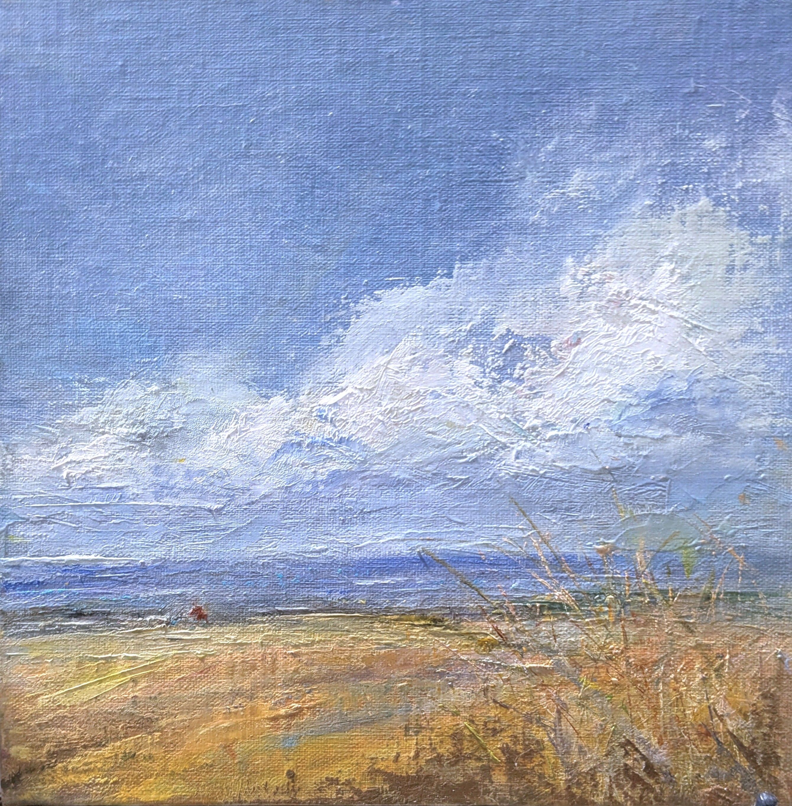 A small oil painting of a sunlit coastal field  on a late summer day.