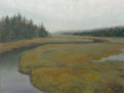 A salt marsh and river in the autumn.