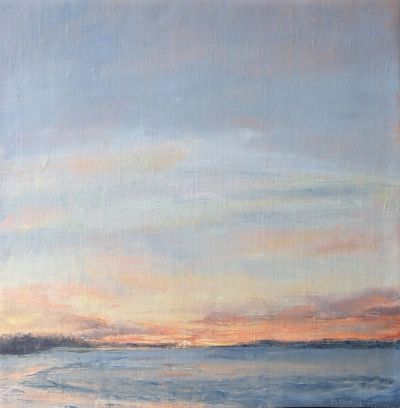 A pink sunset over a receding beach.