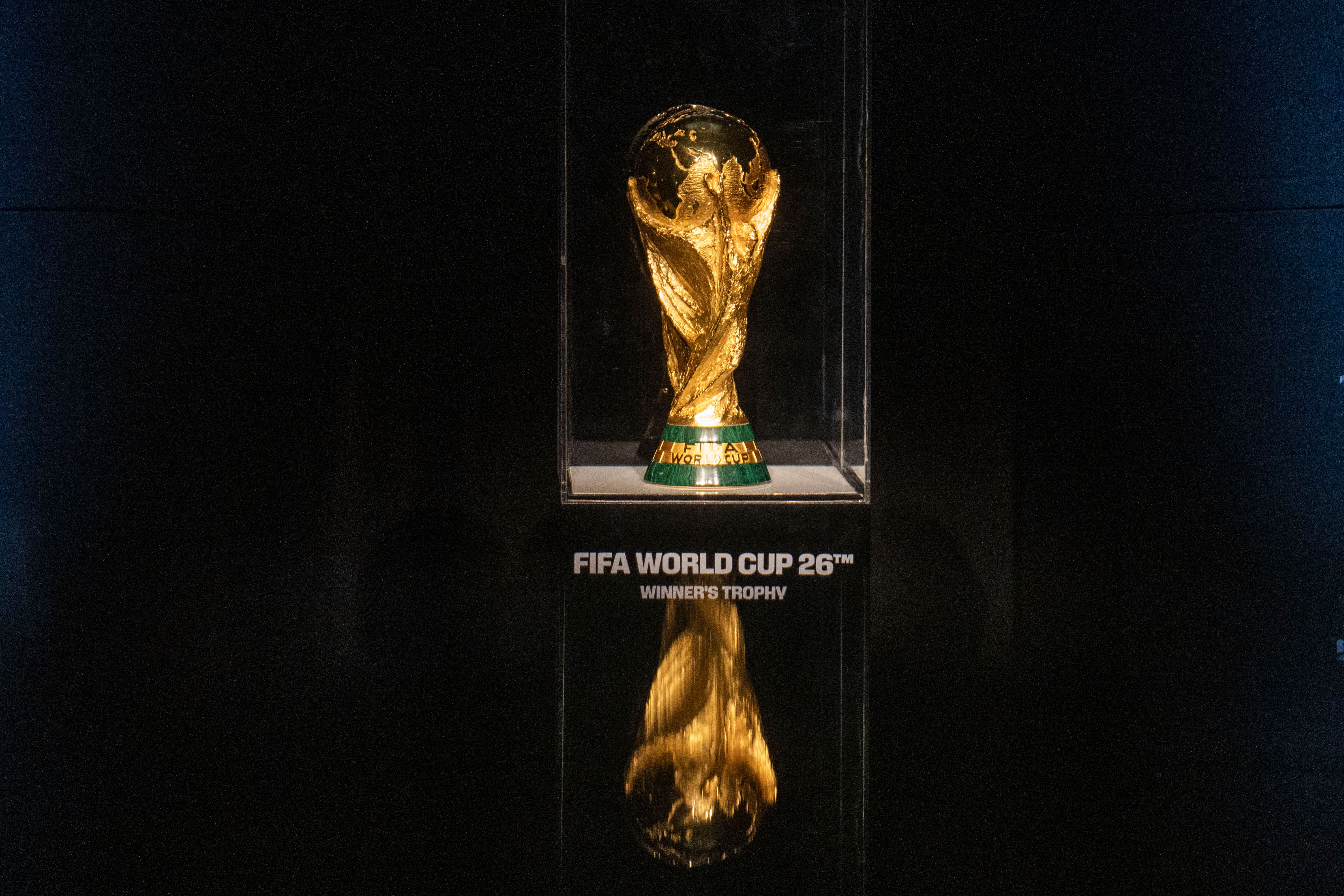 Appearance of the 2025 World Cup trophy during the unveiling of the countdown clock 1 year ahead of the 2026 FIFA World Cup (Photo by Christopher Rogel Blanquet/Getty Images)