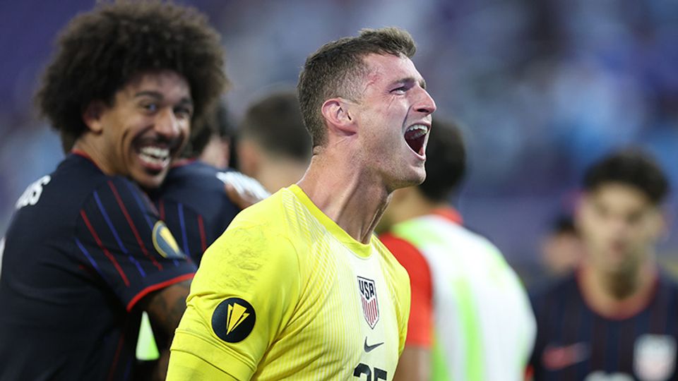 Matt Freese celebrates penalty save