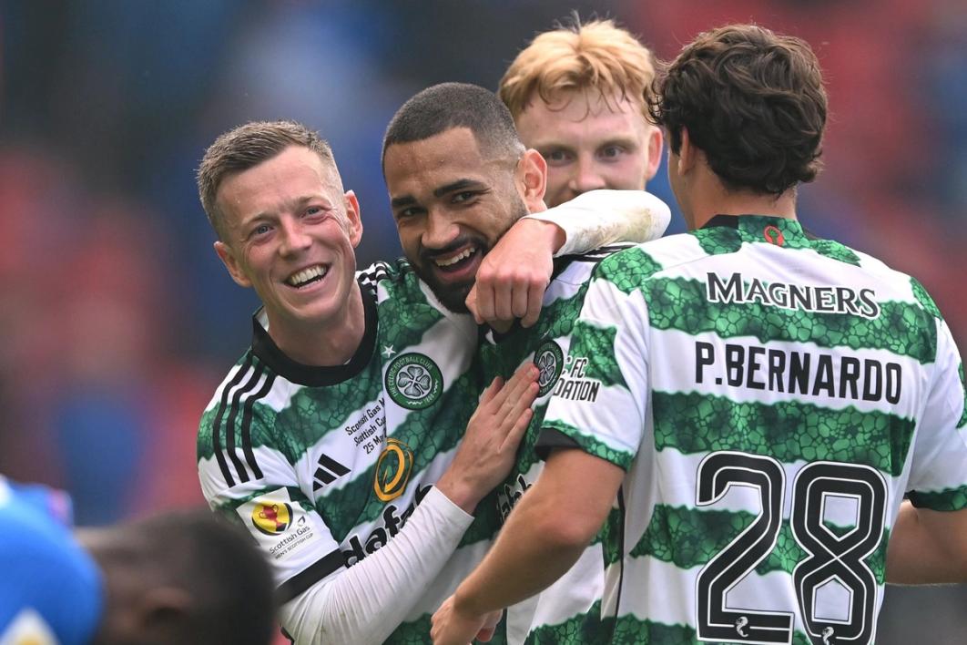 Four Celtic players including Cameron Carter Vickers smile and celebrate