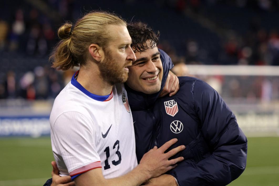Tim Ream #13 of United States greets Gio Reyna #7 after the match between United States and Paraguay (Photo by John Dorton/ISI Photos/USSF/Getty Images)