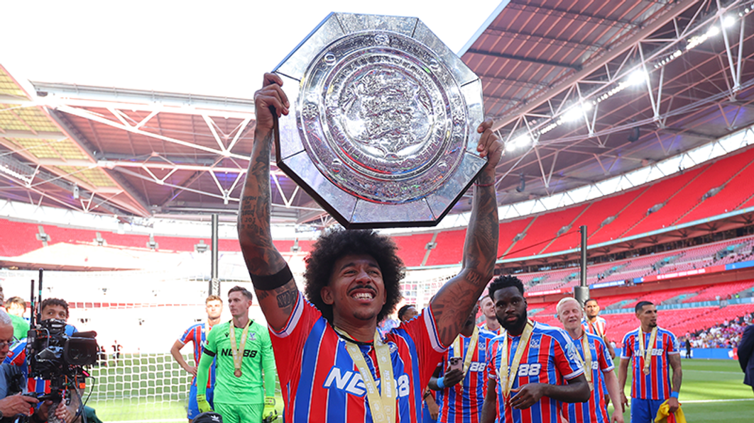Chris Richards lifts trophy 