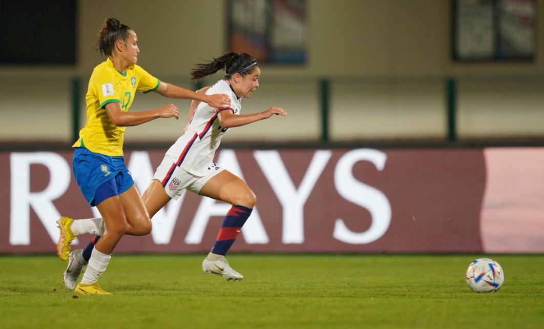 Emeri Adames runs towards a ball while a Brazilian defender reaches for her shoulder​​​​‌﻿‍﻿​‍​‍‌‍﻿﻿‌﻿​‍‌‍‍‌‌‍‌﻿‌‍‍‌‌‍﻿‍​‍​‍​﻿‍‍​‍​‍‌﻿​﻿‌‍​‌‌‍﻿‍‌‍‍‌‌﻿‌​‌﻿‍‌​‍﻿‍‌‍‍‌‌‍﻿﻿​‍​‍​‍﻿​​‍​‍‌‍‍​‌﻿​‍‌‍‌‌‌‍‌‍​‍​‍​﻿‍‍​‍​‍‌‍‍​‌﻿‌​‌﻿‌​‌﻿​​‌﻿​﻿​﻿‍‍​‍﻿﻿​‍﻿﻿‌﻿‌‌‌﻿​﻿‌﻿​﻿‌‍‌‍​‍﻿‍‌﻿​﻿‌‍​‌‌‍﻿‍‌‍‍‌‌﻿‌​‌﻿‍‌​‍﻿‍‌﻿​﻿‌﻿‌​‌﻿‌‌‌‍‌​‌‍‍‌‌‍﻿﻿​‍﻿﻿‌‍‍‌‌‍﻿‍‌﻿‌​‌‍‌‌‌‍﻿‍‌﻿‌​​‍﻿﻿‌‍‌‌‌‍‌​‌‍‍‌‌﻿‌​​‍﻿﻿‌‍﻿‌‌‍﻿﻿‌‍‌​‌‍‌‌​﻿﻿‌‌﻿​​‌﻿​‍‌‍‌‌‌﻿​﻿‌‍‌‌‌‍﻿‍‌﻿‌​‌‍​‌‌﻿‌​‌‍‍‌‌‍﻿﻿‌‍﻿‍​﻿‍﻿‌‍‍‌‌‍‌​​﻿﻿‌​﻿​﻿​﻿‍‌​﻿‌﻿‌‍​‌​﻿‌‌​﻿‌‌​﻿‌‍‌‍‌​​‍﻿‌​﻿​​​﻿‌﻿​﻿​​​﻿​﻿​‍﻿‌​﻿‌​​﻿‌‍​﻿​‍‌‍​﻿​‍﻿‌​﻿‍​‌‍​‌​﻿‌﻿‌‍​‌​‍﻿‌​﻿​‌​﻿​﻿​﻿‍​​﻿​​‌‍​‍​﻿‍​​﻿​​​﻿​‌​﻿​﻿‌‍​‌​﻿​﻿​﻿​‍​﻿‍﻿‌﻿‌​‌﻿‍‌‌﻿​​‌‍‌‌​﻿﻿‌‌﻿​﻿‌﻿‌​‌‍﻿﻿‌﻿​‍‌﻿‍‌​﻿‍﻿‌﻿​​‌‍​‌‌﻿‌​‌‍‍​​﻿﻿‌‌‍​﻿‌‍﻿﻿‌‍﻿‍‌﻿‌​‌‍‌‌‌‍﻿‍‌﻿‌​​‍‌‌​﻿‌‌‌​​‍‌‌﻿﻿‌‍‍﻿‌‍‌‌‌﻿‍‌​‍‌‌​﻿​﻿‌​‌​​‍‌‌​﻿​﻿‌​‌​​‍‌‌​﻿​‍​﻿​‍‌‍‌‌​﻿‍​​﻿‍​​﻿‌​​﻿‌‍​﻿​‍​﻿​‌‌‍‌‌‌‍​﻿​﻿‍​​﻿​‌​﻿‌﻿​‍‌‌​﻿​‍​﻿​‍​‍‌‌​﻿‌‌‌​‌​​‍﻿‍‌‍‍‌‌‍﻿‌‌‍​‌‌‍‌﻿‌‍‌‌​‍﻿‍‌‍​‌‌‍﻿​‌﻿‌​​﻿﻿﻿‌‍​‍‌‍​‌‌﻿​﻿‌‍‌‌‌‌‌‌‌﻿​‍‌‍﻿​​﻿﻿‌‌‍‍​‌﻿‌​‌﻿‌​‌﻿​​‌﻿​﻿​‍‌‌​﻿​﻿‌​​‌​‍‌‌​﻿​‍‌​‌‍​‍‌‌​﻿​‍‌​‌‍‌﻿‌‌‌﻿​﻿‌﻿​﻿‌‍‌‍​‍﻿‍‌﻿​﻿‌‍​‌‌‍﻿‍‌‍‍‌‌﻿‌​‌﻿‍‌​‍﻿‍‌﻿​﻿‌﻿‌​‌﻿‌‌‌‍‌​‌‍‍‌‌‍﻿﻿​‍‌‍‌‍‍‌‌‍‌​​﻿﻿‌​﻿​﻿​﻿‍‌​﻿‌﻿‌‍​‌​﻿‌‌​﻿‌‌​﻿‌‍‌‍‌​​‍﻿‌​﻿​​​﻿‌﻿​﻿​​​﻿​﻿​‍﻿‌​﻿‌​​﻿‌‍​﻿​‍‌‍​﻿​‍﻿‌​﻿‍​‌‍​‌​﻿‌﻿‌‍​‌​‍﻿‌​﻿​‌​﻿​﻿​﻿‍​​﻿​​‌‍​‍​﻿‍​​﻿​​​﻿​‌​﻿​﻿‌‍​‌​﻿​﻿​﻿​‍​‍‌‍‌﻿‌​‌﻿‍‌‌﻿​​‌‍‌‌​﻿﻿‌‌﻿​﻿‌﻿‌​‌‍﻿﻿‌﻿​‍‌﻿‍‌​‍‌‍‌﻿​​‌‍​‌‌﻿‌​‌‍‍​​﻿﻿‌‌‍​﻿‌‍﻿﻿‌‍﻿‍‌﻿‌​‌‍‌‌‌‍﻿‍‌﻿‌​​‍‌‌​﻿‌‌‌​​‍‌‌﻿﻿‌‍‍﻿‌‍‌‌‌﻿‍‌​‍‌‌​﻿​﻿‌​‌​​‍‌‌​﻿​﻿‌​‌​​‍‌‌​﻿​‍​﻿​‍‌‍‌‌​﻿‍​​﻿‍​​﻿‌​​﻿‌‍​﻿​‍​﻿​‌‌‍‌‌‌‍​﻿​﻿‍​​﻿​‌​﻿‌﻿​‍‌‌​﻿​‍​﻿​‍​‍‌‌​﻿‌‌‌​‌​​‍﻿‍‌‍‍‌‌‍﻿‌‌‍​‌‌‍‌﻿‌‍‌‌​‍﻿‍‌‍​‌‌‍﻿​‌﻿‌​​‍​‍‌﻿﻿‌