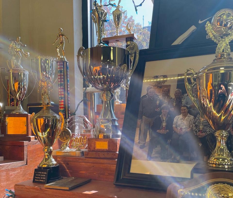 Some of the trophies in the front window of the Clube Desportivo Faialense