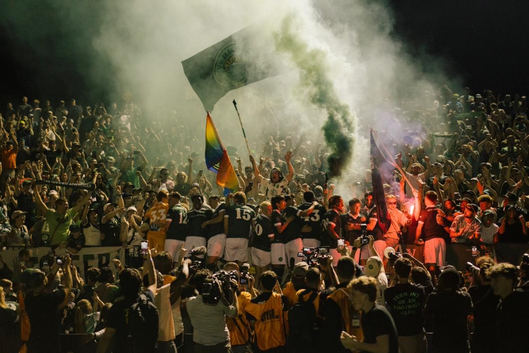 Vermont Green FC celebrating with supporters after winning 2025 USL League Two Final | Image Credit: Patrick McCormack