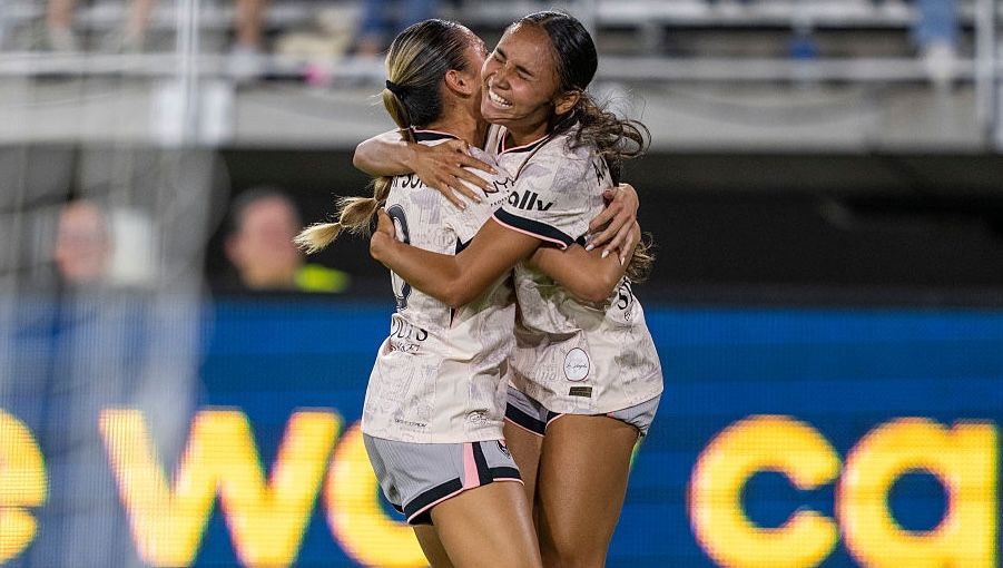 Alyssa and Gisele embrace in celebration