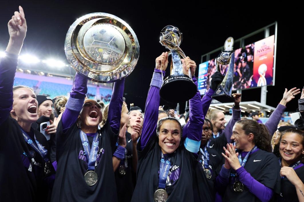 The Orlando Pride celebrate winning the 2024 NWSL Championship