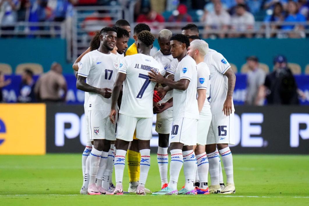 The Panama National Team huddles up on the field during their Copa America opener against Uruguay in Hard Rock Stadium