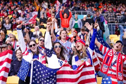US Soccer fans cheer from the stands during a match