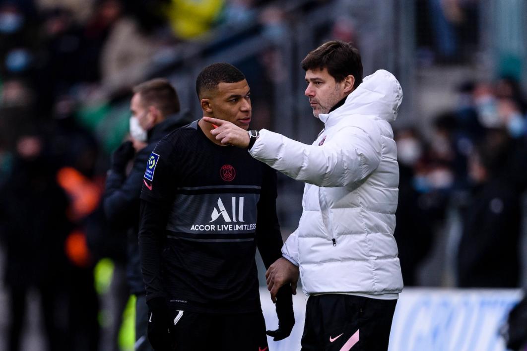 Mauricio Pochettino and Kylian Mbappé on the sideline