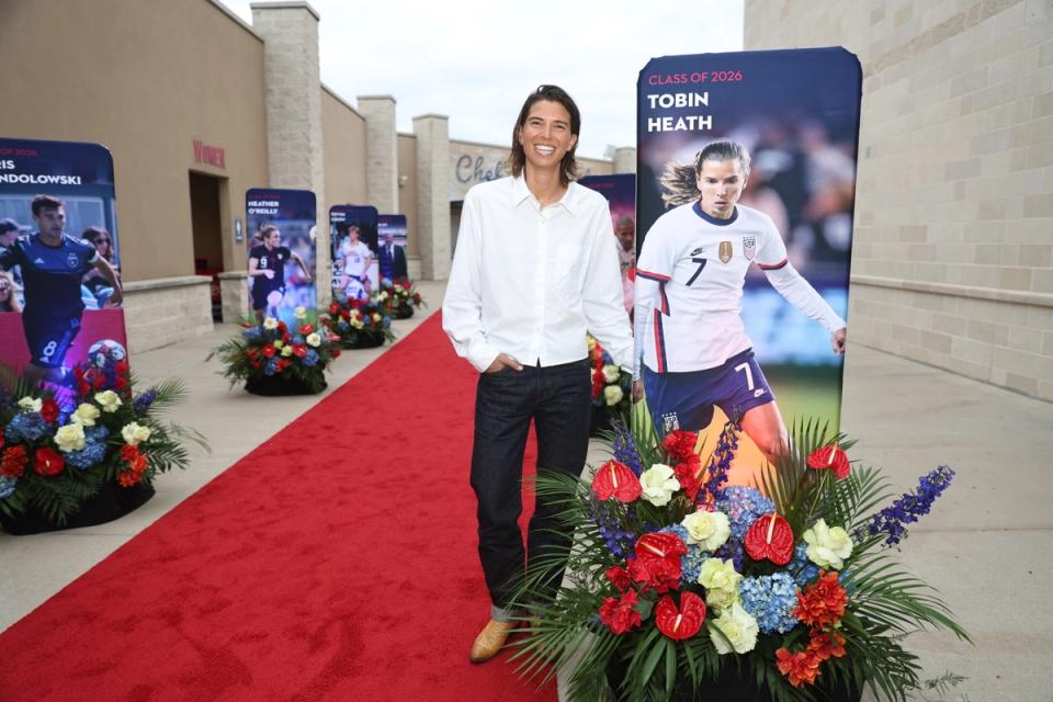 Tobin Heath walks the red carpet ahead of her induction into the National Soccer Hall of Fame.