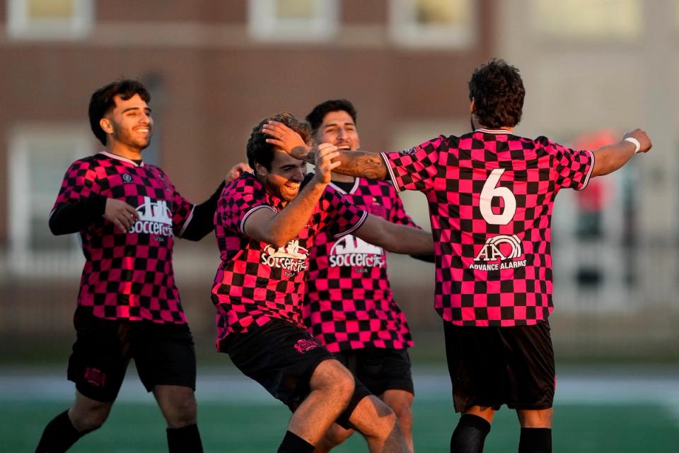 Participants in the qualifying rounds of the 2025 U.S. Open Cup celebrate on the field