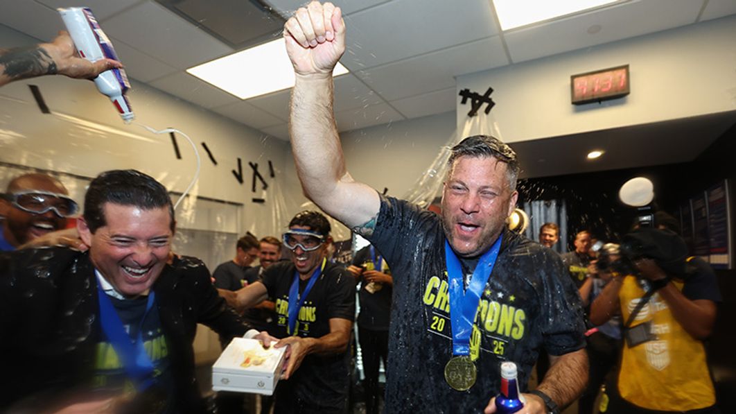  B.J. Callaghan and Nashville SC celebrating a champagne shower in the locker room