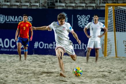 A US Beach MNT player takes a shot during a match