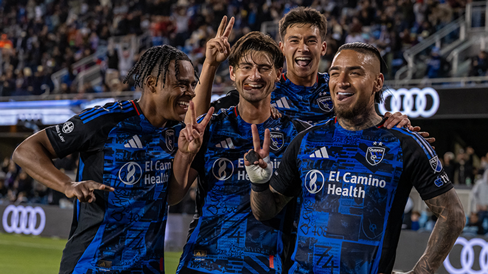 San Jose Earthquakes celebrating with a two-finger peace sign gesture