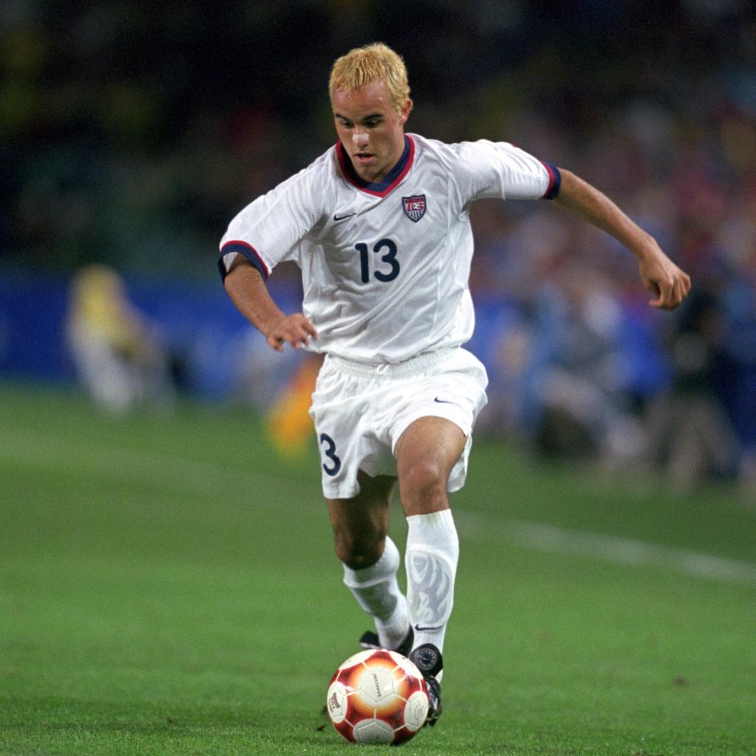 Landon Donovan dribbles the ball during a match in the 2000 Olympic Games