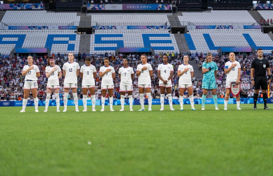 USA Starting 11 Sam Coffey, Rose Lavelle, Tierna Davidson, Sophia Smith, Mallory Swanson, Crystal Dunn, Trinity Rodman, Naomi Girma, Emily Fox, Alyssa Naeher and Lindsey Horan at midfield during the national anthem