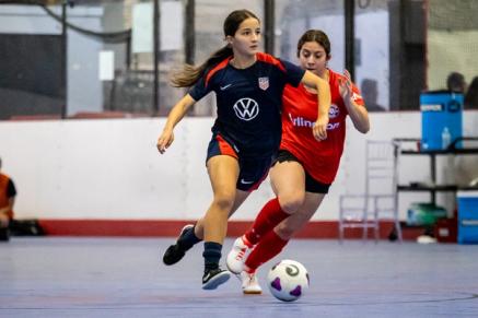 Two US Futsal WNT players on a court
