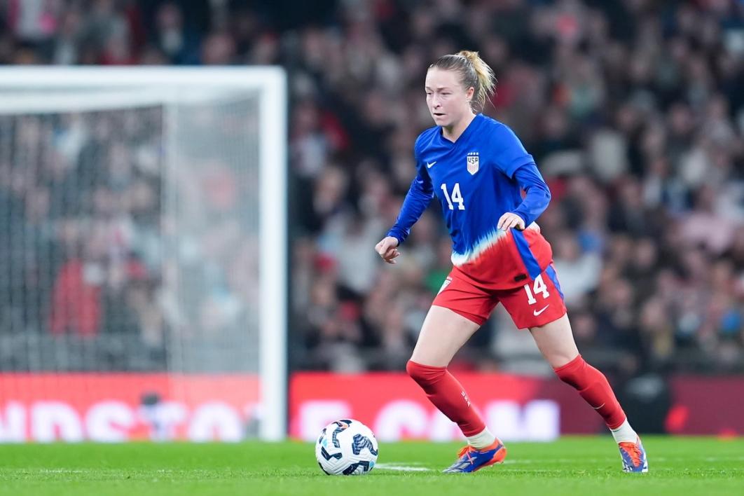 Emily Sonnett dribbles the ball for the USWNT