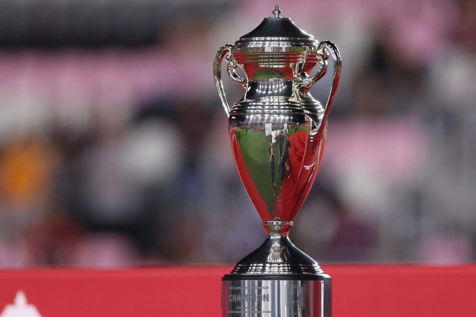 us open cup trophy on stand with blurred background