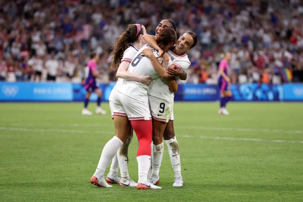 Malloy Swanson Lynn Williams Rose Lavelle and Naomi Girma celebrate a USA goal over Germany