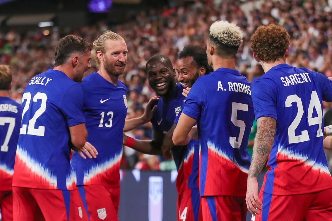 USMNT players celebrate following a Yunus Musah goal