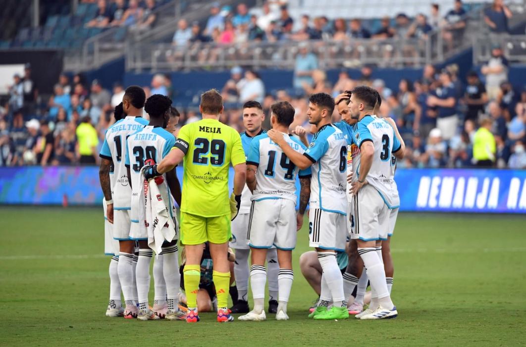 Sporting KC huddles up on the pitch during a match​​​​‌﻿‍﻿​‍​‍‌‍﻿﻿‌﻿​‍‌‍‍‌‌‍‌﻿‌‍‍‌‌‍﻿‍​‍​‍​﻿‍‍​‍​‍‌﻿​﻿‌‍​‌‌‍﻿‍‌‍‍‌‌﻿‌​‌﻿‍‌​‍﻿‍‌‍‍‌‌‍﻿﻿​‍​‍​‍﻿​​‍​‍‌‍‍​‌﻿​‍‌‍‌‌‌‍‌‍​‍​‍​﻿‍‍​‍​‍‌‍‍​‌﻿‌​‌﻿‌​‌﻿​​‌﻿​﻿​﻿‍‍​‍﻿﻿​‍﻿﻿‌﻿‌‌‌﻿​﻿‌﻿​﻿‌‍‌‍​‍﻿‍‌﻿​﻿‌‍​‌‌‍﻿‍‌‍‍‌‌﻿‌​‌﻿‍‌​‍﻿‍‌﻿​﻿‌﻿‌​‌﻿‌‌‌‍‌​‌‍‍‌‌‍﻿﻿​‍﻿﻿‌‍‍‌‌‍﻿‍‌﻿‌​‌‍‌‌‌‍﻿‍‌﻿‌​​‍﻿﻿‌‍‌‌‌‍‌​‌‍‍‌‌﻿‌​​‍﻿﻿‌‍﻿‌‌‍﻿﻿‌‍‌​‌‍‌‌​﻿﻿‌‌﻿​​‌﻿​‍‌‍‌‌‌﻿​﻿‌‍‌‌‌‍﻿‍‌﻿‌​‌‍​‌‌﻿‌​‌‍‍‌‌‍﻿﻿‌‍﻿‍​﻿‍﻿‌‍‍‌‌‍‌​​﻿﻿‌​﻿​﻿​﻿​‌‌‍‌​​﻿​‌​﻿​﻿‌‍​‌​﻿‌​​﻿‌‍​‍﻿‌​﻿‌‍​﻿‌‍‌‍​‌​﻿‌‌​‍﻿‌​﻿‌​​﻿‍​​﻿‍​‌‍​‍​‍﻿‌‌‍​‌‌‍​‍​﻿‌​​﻿‌﻿​‍﻿‌‌‍‌​‌‍‌‍​﻿‍‌​﻿​‌​﻿​‍​﻿‌​​﻿‌‍‌‍‌​‌‍‌​‌‍‌‍‌‍​‌‌‍​‌​﻿‍﻿‌﻿‌​‌﻿‍‌‌﻿​​‌‍‌‌​﻿﻿‌‌﻿​﻿‌﻿‌​‌‍﻿﻿‌﻿​‍‌﻿‍‌​﻿‍﻿‌﻿​​‌‍​‌‌﻿‌​‌‍‍​​﻿﻿‌‌‍​﻿‌‍﻿﻿‌‍﻿‍‌﻿‌​‌‍‌‌‌‍﻿‍‌﻿‌​​‍‌‌​﻿‌‌‌​​‍‌‌﻿﻿‌‍‍﻿‌‍‌‌‌﻿‍‌​‍‌‌​﻿​﻿‌​‌​​‍‌‌​﻿​﻿‌​‌​​‍‌‌​﻿​‍​﻿​‍​﻿​‍​﻿​​​﻿‍‌​﻿‌‌‌‍‌‌​﻿​‍‌‍​‌​﻿​‍​﻿​‍‌‍‌​‌‍‌‍​﻿‌​​‍‌‌​﻿​‍​﻿​‍​‍‌‌​﻿‌‌‌​‌​​‍﻿‍‌‍‍‌‌‍﻿‌‌‍​‌‌‍‌﻿‌‍‌‌​‍﻿‍‌‍​‌‌‍﻿​‌﻿‌​​﻿﻿﻿‌‍​‍‌‍​‌‌﻿​﻿‌‍‌‌‌‌‌‌‌﻿​‍‌‍﻿​​﻿﻿‌‌‍‍​‌﻿‌​‌﻿‌​‌﻿​​‌﻿​﻿​‍‌‌​﻿​﻿‌​​‌​‍‌‌​﻿​‍‌​‌‍​‍‌‌​﻿​‍‌​‌‍‌﻿‌‌‌﻿​﻿‌﻿​﻿‌‍‌‍​‍﻿‍‌﻿​﻿‌‍​‌‌‍﻿‍‌‍‍‌‌﻿‌​‌﻿‍‌​‍﻿‍‌﻿​﻿‌﻿‌​‌﻿‌‌‌‍‌​‌‍‍‌‌‍﻿﻿​‍‌‍‌‍‍‌‌‍‌​​﻿﻿‌​﻿​﻿​﻿​‌‌‍‌​​﻿​‌​﻿​﻿‌‍​‌​﻿‌​​﻿‌‍​‍﻿‌​﻿‌‍​﻿‌‍‌‍​‌​﻿‌‌​‍﻿‌​﻿‌​​﻿‍​​﻿‍​‌‍​‍​‍﻿‌‌‍​‌‌‍​‍​﻿‌​​﻿‌﻿​‍﻿‌‌‍‌​‌‍‌‍​﻿‍‌​﻿​‌​﻿​‍​﻿‌​​﻿‌‍‌‍‌​‌‍‌​‌‍‌‍‌‍​‌‌‍​‌​‍‌‍‌﻿‌​‌﻿‍‌‌﻿​​‌‍‌‌​﻿﻿‌‌﻿​﻿‌﻿‌​‌‍﻿﻿‌﻿​‍‌﻿‍‌​‍‌‍‌﻿​​‌‍​‌‌﻿‌​‌‍‍​​﻿﻿‌‌‍​﻿‌‍﻿﻿‌‍﻿‍‌﻿‌​‌‍‌‌‌‍﻿‍‌﻿‌​​‍‌‌​﻿‌‌‌​​‍‌‌﻿﻿‌‍‍﻿‌‍‌‌‌﻿‍‌​‍‌‌​﻿​﻿‌​‌​​‍‌‌​﻿​﻿‌​‌​​‍‌‌​﻿​‍​﻿​‍​﻿​‍​﻿​​​﻿‍‌​﻿‌‌‌‍‌‌​﻿​‍‌‍​‌​﻿​‍​﻿​‍‌‍‌​‌‍‌‍​﻿‌​​‍‌‌​﻿​‍​﻿​‍​‍‌‌​﻿‌‌‌​‌​​‍﻿‍‌‍‍‌‌‍﻿‌‌‍​‌‌‍‌﻿‌‍‌‌​‍﻿‍‌‍​‌‌‍﻿​‌﻿‌​​‍​‍‌﻿﻿‌