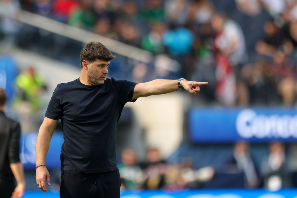 Mauricio Pochettino pointing from the manager's box