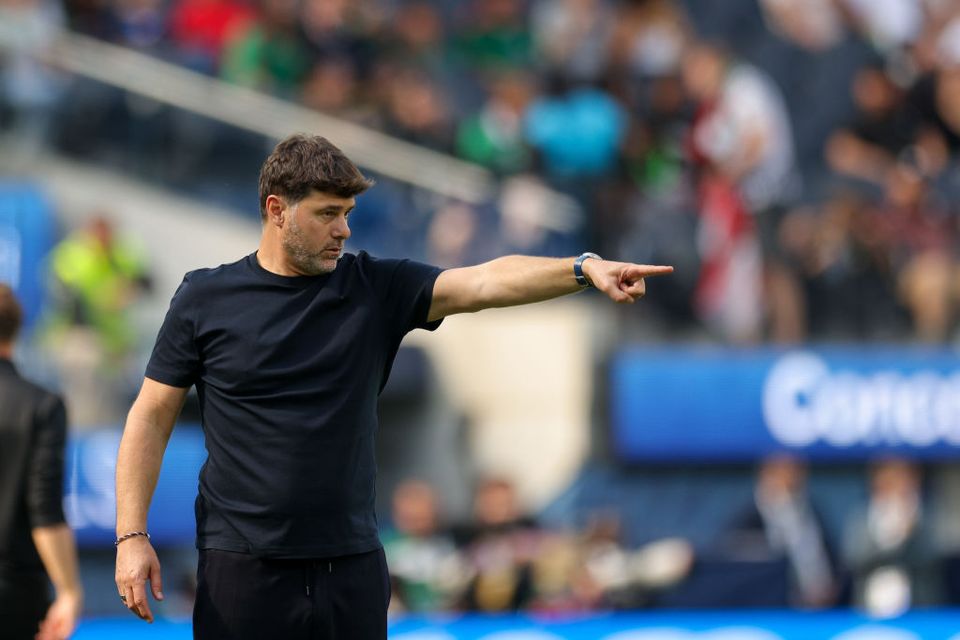 Mauricio Pochettino pointing from the manager's box