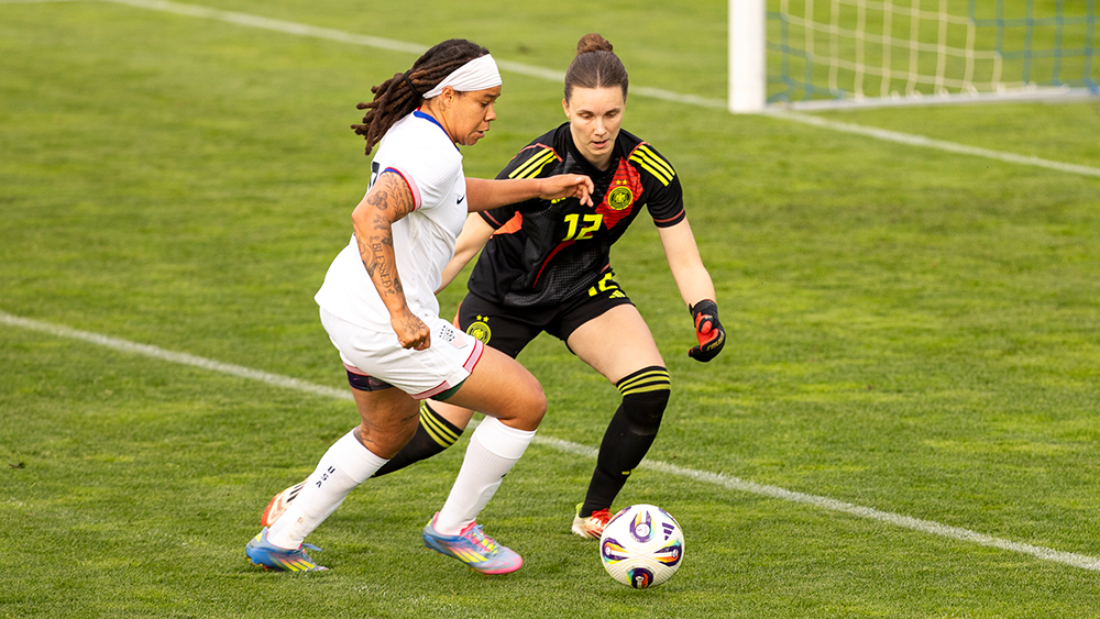 Mia Fichel tries to get past Germany defender