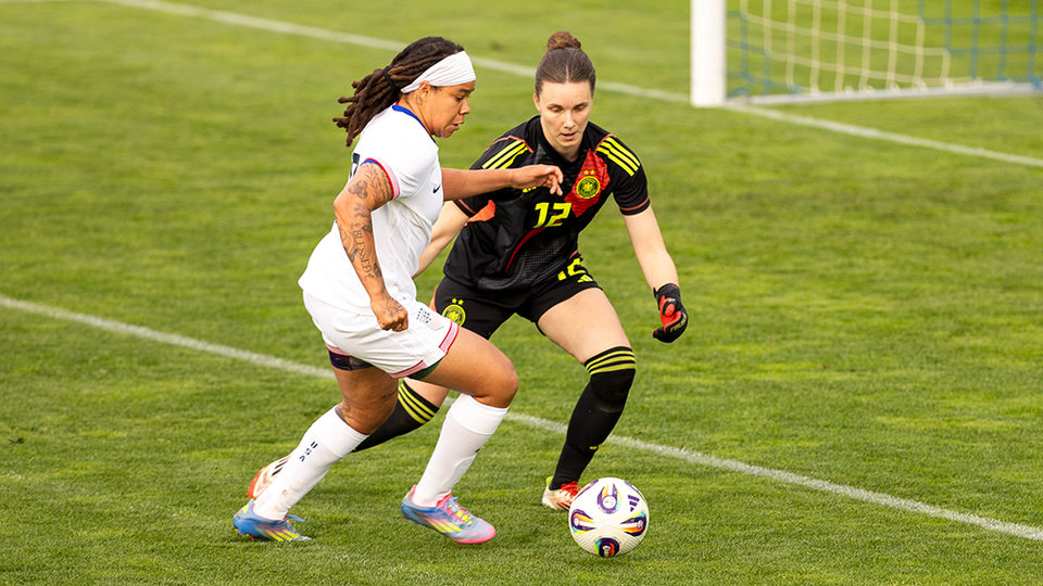 Mia Fichel tries to get past Germany defender