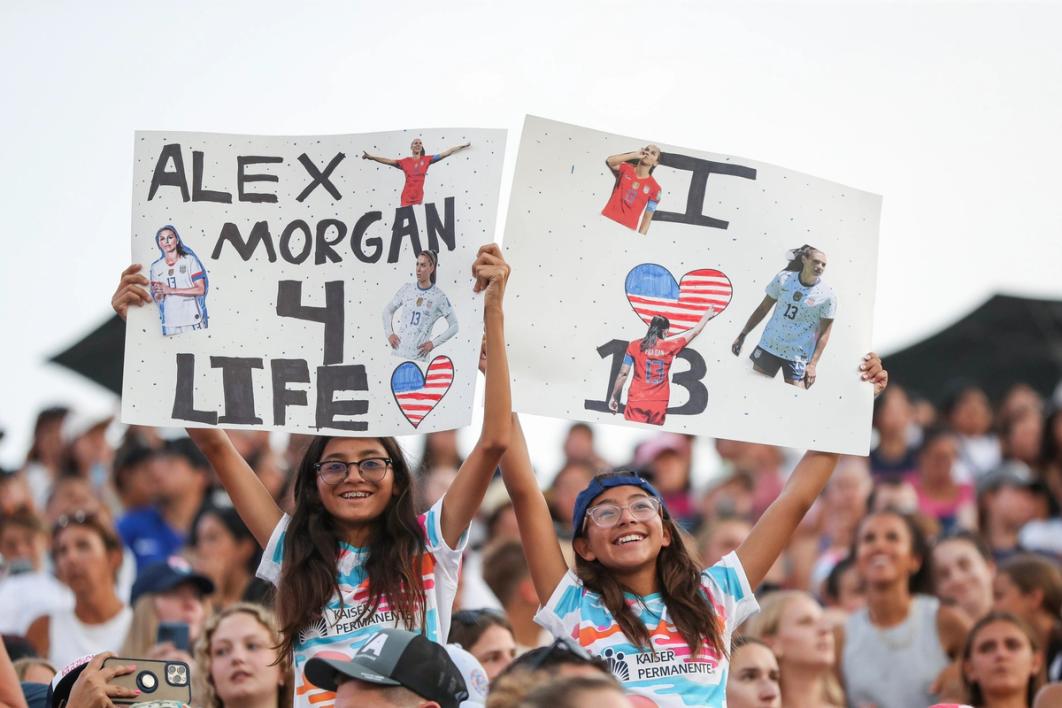 Fans hold signs for Alex Morgan #13 (Photo by Meg Oliphant/Getty Images)​​​​‌﻿‍﻿​‍​‍‌‍﻿﻿‌﻿​‍‌‍‍‌‌‍‌﻿‌‍‍‌‌‍﻿‍​‍​‍​﻿‍‍​‍​‍‌﻿​﻿‌‍​‌‌‍﻿‍‌‍‍‌‌﻿‌​‌﻿‍‌​‍﻿‍‌‍‍‌‌‍﻿﻿​‍​‍​‍﻿​​‍​‍‌‍‍​‌﻿​‍‌‍‌‌‌‍‌‍​‍​‍​﻿‍‍​‍​‍‌‍‍​‌﻿‌​‌﻿‌​‌﻿​​‌﻿​﻿​﻿‍‍​‍﻿﻿​‍﻿﻿‌﻿‌‌‌﻿​﻿‌﻿​﻿‌‍‌‍​‍﻿‍‌﻿​﻿‌‍​‌‌‍﻿‍‌‍‍‌‌﻿‌​‌﻿‍‌​‍﻿‍‌﻿​﻿‌﻿‌​‌﻿‌‌‌‍‌​‌‍‍‌‌‍﻿﻿​‍﻿﻿‌﻿‌﻿‌‍‌‌‌‍​‍​‍﻿﻿‌‍‍‌‌‍﻿‍‌﻿‌​‌‍‌‌‌‍﻿‍‌﻿‌​​‍﻿﻿‌‍‌‌‌‍‌​‌‍‍‌‌﻿‌​​‍﻿﻿‌‍﻿‌‌‍﻿﻿‌‍‌​‌‍‌‌​﻿﻿‌‌﻿​​‌﻿​‍‌‍‌‌‌﻿​﻿‌‍‌‌‌‍﻿‍‌﻿‌​‌‍​‌‌﻿‌​‌‍‍‌‌‍﻿﻿‌‍﻿‍​﻿‍﻿‌‍‍‌‌‍‌​​﻿﻿‌‌‍‌‌​﻿​﻿​﻿​‌​﻿‌​​﻿​‌​﻿​​​﻿‌​​﻿‌﻿​‍﻿‌​﻿‌​‌‍​‍​﻿‍‌​﻿‌﻿​‍﻿‌​﻿‌​​﻿‍‌‌‍​‍​﻿‌‍​‍﻿‌‌‍​‍​﻿​‍​﻿‌﻿‌‍​‍​‍﻿‌​﻿‌﻿​﻿‌​​﻿‌﻿​﻿‌​​﻿​‌​﻿‌‌​﻿​​​﻿‌‍​﻿‌‍​﻿​﻿‌‍‌‌​﻿‍​​﻿‍﻿‌﻿‌​‌﻿‍‌‌﻿​​‌‍‌‌​﻿﻿‌‌﻿​﻿‌﻿‌​‌‍﻿﻿‌﻿​‍‌﻿‍‌​﻿‍﻿‌﻿​​‌‍​‌‌﻿‌​‌‍‍​​﻿﻿‌‌‍​﻿‌‍﻿﻿‌‍﻿‍‌﻿‌​‌‍‌‌‌‍﻿‍‌﻿‌​​‍‌‌​﻿‌‌‌​​‍‌‌﻿﻿‌‍‍﻿‌‍‌‌‌﻿‍‌​‍‌‌​﻿​﻿‌​‌​​‍‌‌​﻿​﻿‌​‌​​‍‌‌​﻿​‍​﻿​‍​﻿‌‍​﻿‌​​﻿​‍‌‍​‍‌‍​‍​﻿‍​‌‍​﻿‌‍‌‌‌‍‌‍​﻿​​​﻿‌‍‌‍​‌​‍‌‌​﻿​‍​﻿​‍​‍‌‌​﻿‌‌‌​‌​​‍﻿‍‌‍​‍‌‍﻿﻿‌‍‌​‌﻿‍‌‌‌‌​‌‍‌‌‌﻿‍​‌﻿‌​​‍‌‌​﻿‌‌‌​​‍‌‌﻿﻿‌‍‍﻿‌‍‌‌‌﻿‍‌​‍‌‌​﻿​﻿‌​‌​​‍‌‌​﻿​﻿‌​‌​​‍‌‌​﻿​‍​﻿​‍‌‍‌​​﻿‌‌​﻿‌‍‌‍‌​​﻿‌​​﻿‌‌​﻿​‌​﻿‌‌​﻿​‌​﻿​​‌‍‌​‌‍​‍​‍‌‌​﻿​‍​﻿​‍​‍‌‌​﻿‌‌‌​‌​​‍﻿‍‌‍‍‌‌‍﻿‌‌‍​‌‌‍‌﻿‌‍‌‌​‍﻿‍‌‍​‌‌‍﻿​‌﻿‌​​﻿﻿﻿‌‍​‍‌‍​‌‌﻿​﻿‌‍‌‌‌‌‌‌‌﻿​‍‌‍﻿​​﻿﻿‌‌‍‍​‌﻿‌​‌﻿‌​‌﻿​​‌﻿​﻿​‍‌‌​﻿​﻿‌​​‌​‍‌‌​﻿​‍‌​‌‍​‍‌‌​﻿​‍‌​‌‍‌﻿‌‌‌﻿​﻿‌﻿​﻿‌‍‌‍​‍﻿‍‌﻿​﻿‌‍​‌‌‍﻿‍‌‍‍‌‌﻿‌​‌﻿‍‌​‍﻿‍‌﻿​﻿‌﻿‌​‌﻿‌‌‌‍‌​‌‍‍‌‌‍﻿﻿​‍‌‌​﻿​‍‌​‌‍‌﻿‌﻿‌‍‌‌‌‍​‍​‍‌‍‌‍‍‌‌‍‌​​﻿﻿‌‌‍‌‌​﻿​﻿​﻿​‌​﻿‌​​﻿​‌​﻿​​​﻿‌​​﻿‌﻿​‍﻿‌​﻿‌​‌‍​‍​﻿‍‌​﻿‌﻿​‍﻿‌​﻿‌​​﻿‍‌‌‍​‍​﻿‌‍​‍﻿‌‌‍​‍​﻿​‍​﻿‌﻿‌‍​‍​‍﻿‌​﻿‌﻿​﻿‌​​﻿‌﻿​﻿‌​​﻿​‌​﻿‌‌​﻿​​​﻿‌‍​﻿‌‍​﻿​﻿‌‍‌‌​﻿‍​​‍‌‍‌﻿‌​‌﻿‍‌‌﻿​​‌‍‌‌​﻿﻿‌‌﻿​﻿‌﻿‌​‌‍﻿﻿‌﻿​‍‌﻿‍‌​‍‌‍‌﻿​​‌‍​‌‌﻿‌​‌‍‍​​﻿﻿‌‌‍​﻿‌‍﻿﻿‌‍﻿‍‌﻿‌​‌‍‌‌‌‍﻿‍‌﻿‌​​‍‌‌​﻿‌‌‌​​‍‌‌﻿﻿‌‍‍﻿‌‍‌‌‌﻿‍‌​‍‌‌​﻿​﻿‌​‌​​‍‌‌​﻿​﻿‌​‌​​‍‌‌​﻿​‍​﻿​‍​﻿‌‍​﻿‌​​﻿​‍‌‍​‍‌‍​‍​﻿‍​‌‍​﻿‌‍‌‌‌‍‌‍​﻿​​​﻿‌‍‌‍​‌​‍‌‌​﻿​‍​﻿​‍​‍‌‌​﻿‌‌‌​‌​​‍﻿‍‌‍​‍‌‍﻿﻿‌‍‌​‌﻿‍‌‌‌‌​‌‍‌‌‌﻿‍​‌﻿‌​​‍‌‌​﻿‌‌‌​​‍‌‌﻿﻿‌‍‍﻿‌‍‌‌‌﻿‍‌​‍‌‌​﻿​﻿‌​‌​​‍‌‌​﻿​﻿‌​‌​​‍‌‌​﻿​‍​﻿​‍‌‍‌​​﻿‌‌​﻿‌‍‌‍‌​​﻿‌​​﻿‌‌​﻿​‌​﻿‌‌​﻿​‌​﻿​​‌‍‌​‌‍​‍​‍‌‌​﻿​‍​﻿​‍​‍‌‌​﻿‌‌‌​‌​​‍﻿‍‌‍‍‌‌‍﻿‌‌‍​‌‌‍‌﻿‌‍‌‌​‍﻿‍‌‍​‌‌‍﻿​‌﻿‌​​‍​‍‌﻿﻿‌