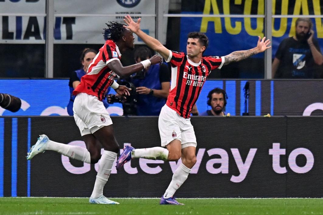 Christian Pulisic celebrates for AC Milan