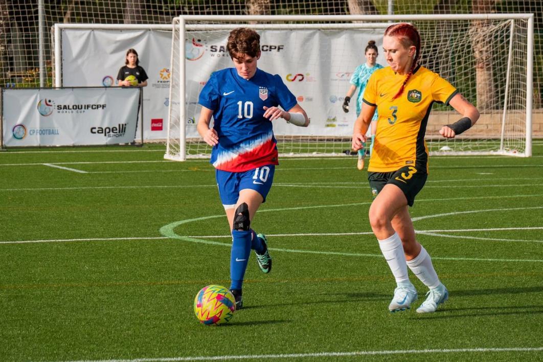 The US CP WNT and Australia on the field during a match