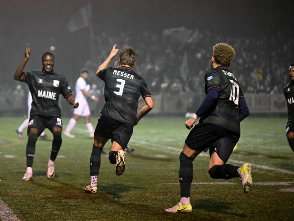 Portland players celebrate during an Open Cup match