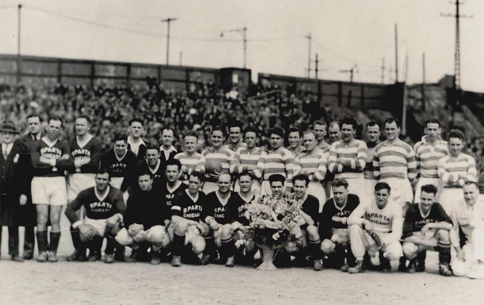 Sparta AC players and staff center field with a trophy