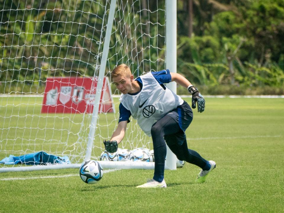 Goalkeeper Zackory Campagnolo rolls the ball out during training. 