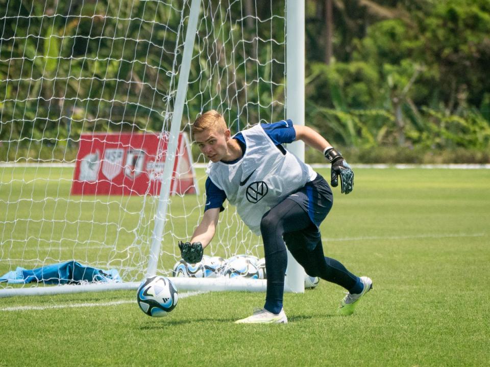 Goalkeeper Zackory Campagnolo rolls the ball out during training.