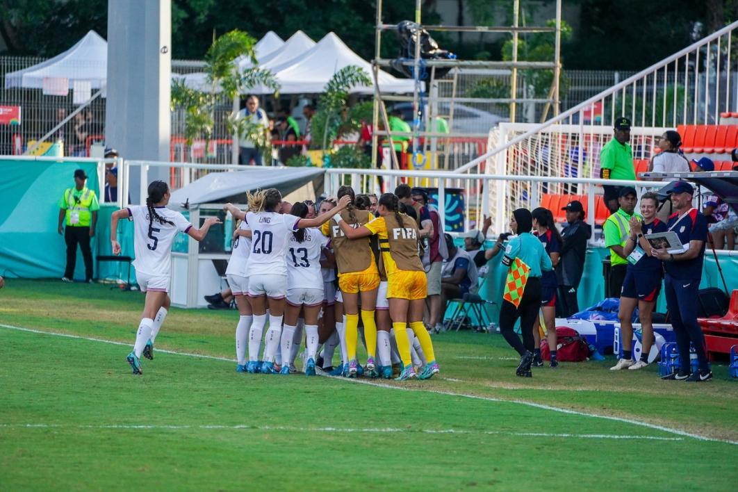 U-17 WYNT players celebrate together