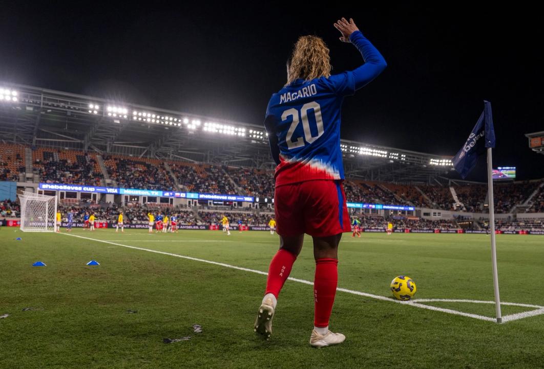 Cat Macario gets ready to take a corner kick during a match against Colombia