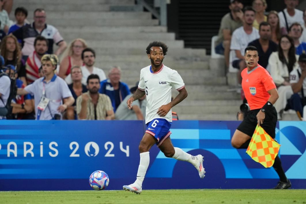 Gianluca Busio dribbles the ball upfield with crowd in the background and a referee trailing​​​​‌﻿‍﻿​‍​‍‌‍﻿﻿‌﻿​‍‌‍‍‌‌‍‌﻿‌‍‍‌‌‍﻿‍​‍​‍​﻿‍‍​‍​‍‌﻿​﻿‌‍​‌‌‍﻿‍‌‍‍‌‌﻿‌​‌﻿‍‌​‍﻿‍‌‍‍‌‌‍﻿﻿​‍​‍​‍﻿​​‍​‍‌‍‍​‌﻿​‍‌‍‌‌‌‍‌‍​‍​‍​﻿‍‍​‍​‍‌‍‍​‌﻿‌​‌﻿‌​‌﻿​​‌﻿​﻿​﻿‍‍​‍﻿﻿​‍﻿﻿‌﻿‌‌‌﻿​﻿‌﻿​﻿‌‍‌‍​‍﻿‍‌﻿​﻿‌‍​‌‌‍﻿‍‌‍‍‌‌﻿‌​‌﻿‍‌​‍﻿‍‌﻿​﻿‌﻿‌​‌﻿‌‌‌‍‌​‌‍‍‌‌‍﻿﻿​‍﻿﻿‌‍‍‌‌‍﻿‍‌﻿‌​‌‍‌‌‌‍﻿‍‌﻿‌​​‍﻿﻿‌‍‌‌‌‍‌​‌‍‍‌‌﻿‌​​‍﻿﻿‌‍﻿‌‌‍﻿﻿‌‍‌​‌‍‌‌​﻿﻿‌‌﻿​​‌﻿​‍‌‍‌‌‌﻿​﻿‌‍‌‌‌‍﻿‍‌﻿‌​‌‍​‌‌﻿‌​‌‍‍‌‌‍﻿﻿‌‍﻿‍​﻿‍﻿‌‍‍‌‌‍‌​​﻿﻿‌‌‍​﻿‌‍​‌​﻿‌‍​﻿​‌​﻿​﻿‌‍​‌​﻿​‌‌‍​‍​‍﻿‌​﻿​‍​﻿​​​﻿‍‌​﻿‌‍​‍﻿‌​﻿‌​‌‍‌​‌‍‌‍​﻿‌‍​‍﻿‌​﻿‍‌‌‍‌‍​﻿​‌​﻿​‌​‍﻿‌​﻿‌﻿​﻿‍‌​﻿​​‌‍​﻿‌‍‌​​﻿​‌‌‍​﻿​﻿‌​‌‍‌​​﻿​‌​﻿‍‌​﻿‌​​﻿‍﻿‌﻿‌​‌﻿‍‌‌﻿​​‌‍‌‌​﻿﻿‌‌﻿​﻿‌﻿‌​‌‍﻿﻿‌﻿​‍‌﻿‍‌​﻿‍﻿‌﻿​​‌‍​‌‌﻿‌​‌‍‍​​﻿﻿‌‌‍​﻿‌‍﻿﻿‌‍﻿‍‌﻿‌​‌‍‌‌‌‍﻿‍‌﻿‌​​‍‌‌​﻿‌‌‌​​‍‌‌﻿﻿‌‍‍﻿‌‍‌‌‌﻿‍‌​‍‌‌​﻿​﻿‌​‌​​‍‌‌​﻿​﻿‌​‌​​‍‌‌​﻿​‍​﻿​‍‌‍​﻿​﻿‌‌​﻿‌﻿​﻿​‌​﻿​​‌‍‌​​﻿​‍​﻿‌﻿‌‍‌‍​﻿​‍‌‍​‍‌‍​‍​‍‌‌​﻿​‍​﻿​‍​‍‌‌​﻿‌‌‌​‌​​‍﻿‍‌‍‍‌‌‍﻿‌‌‍​‌‌‍‌﻿‌‍‌‌‌​‌​‌‍‌‌‌﻿​﻿‌‍‍﻿‌﻿‌​‌‍﻿﻿‌﻿​​​‍﻿‍‌‍​‌‌‍﻿​‌﻿‌​​﻿﻿﻿‌‍​‍‌‍​‌‌﻿​﻿‌‍‌‌‌‌‌‌‌﻿​‍‌‍﻿​​﻿﻿‌‌‍‍​‌﻿‌​‌﻿‌​‌﻿​​‌﻿​﻿​‍‌‌​﻿​﻿‌​​‌​‍‌‌​﻿​‍‌​‌‍​‍‌‌​﻿​‍‌​‌‍‌﻿‌‌‌﻿​﻿‌﻿​﻿‌‍‌‍​‍﻿‍‌﻿​﻿‌‍​‌‌‍﻿‍‌‍‍‌‌﻿‌​‌﻿‍‌​‍﻿‍‌﻿​﻿‌﻿‌​‌﻿‌‌‌‍‌​‌‍‍‌‌‍﻿﻿​‍‌‍‌‍‍‌‌‍‌​​﻿﻿‌‌‍​﻿‌‍​‌​﻿‌‍​﻿​‌​﻿​﻿‌‍​‌​﻿​‌‌‍​‍​‍﻿‌​﻿​‍​﻿​​​﻿‍‌​﻿‌‍​‍﻿‌​﻿‌​‌‍‌​‌‍‌‍​﻿‌‍​‍﻿‌​﻿‍‌‌‍‌‍​﻿​‌​﻿​‌​‍﻿‌​﻿‌﻿​﻿‍‌​﻿​​‌‍​﻿‌‍‌​​﻿​‌‌‍​﻿​﻿‌​‌‍‌​​﻿​‌​﻿‍‌​﻿‌​​‍‌‍‌﻿‌​‌﻿‍‌‌﻿​​‌‍‌‌​﻿﻿‌‌﻿​﻿‌﻿‌​‌‍﻿﻿‌﻿​‍‌﻿‍‌​‍‌‍‌﻿​​‌‍​‌‌﻿‌​‌‍‍​​﻿﻿‌‌‍​﻿‌‍﻿﻿‌‍﻿‍‌﻿‌​‌‍‌‌‌‍﻿‍‌﻿‌​​‍‌‌​﻿‌‌‌​​‍‌‌﻿﻿‌‍‍﻿‌‍‌‌‌﻿‍‌​‍‌‌​﻿​﻿‌​‌​​‍‌‌​﻿​﻿‌​‌​​‍‌‌​﻿​‍​﻿​‍‌‍​﻿​﻿‌‌​﻿‌﻿​﻿​‌​﻿​​‌‍‌​​﻿​‍​﻿‌﻿‌‍‌‍​﻿​‍‌‍​‍‌‍​‍​‍‌‌​﻿​‍​﻿​‍​‍‌‌​﻿‌‌‌​‌​​‍﻿‍‌‍‍‌‌‍﻿‌‌‍​‌‌‍‌﻿‌‍‌‌‌​‌​‌‍‌‌‌﻿​﻿‌‍‍﻿‌﻿‌​‌‍﻿﻿‌﻿​​​‍﻿‍‌‍​‌‌‍﻿​‌﻿‌​​‍​‍‌﻿﻿‌