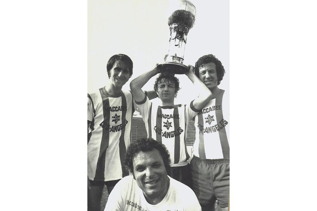 Benny Binshtock holds the Dewar Cup (the original Open Cup trophy) with fellow Maccabees ​​​​‌﻿‍﻿​‍​‍‌‍﻿﻿‌﻿​‍‌‍‍‌‌‍‌﻿‌‍‍‌‌‍﻿‍​‍​‍​﻿‍‍​‍​‍‌﻿​﻿‌‍​‌‌‍﻿‍‌‍‍‌‌﻿‌​‌﻿‍‌​‍﻿‍‌‍‍‌‌‍﻿﻿​‍​‍​‍﻿​​‍​‍‌‍‍​‌﻿​‍‌‍‌‌‌‍‌‍​‍​‍​﻿‍‍​‍​‍‌‍‍​‌﻿‌​‌﻿‌​‌﻿​​‌﻿​﻿​﻿‍‍​‍﻿﻿​‍﻿﻿‌﻿‌‌‌﻿​﻿‌﻿​﻿‌‍‌‍​‍﻿‍‌﻿​﻿‌‍​‌‌‍﻿‍‌‍‍‌‌﻿‌​‌﻿‍‌​‍﻿‍‌﻿​﻿‌﻿‌​‌﻿‌‌‌‍‌​‌‍‍‌‌‍﻿﻿​‍﻿﻿‌‍‍‌‌‍﻿‍‌﻿‌​‌‍‌‌‌‍﻿‍‌﻿‌​​‍﻿﻿‌‍‌‌‌‍‌​‌‍‍‌‌﻿‌​​‍﻿﻿‌‍﻿‌‌‍﻿﻿‌‍‌​‌‍‌‌​﻿﻿‌‌﻿​​‌﻿​‍‌‍‌‌‌﻿​﻿‌‍‌‌‌‍﻿‍‌﻿‌​‌‍​‌‌﻿‌​‌‍‍‌‌‍﻿﻿‌‍﻿‍​﻿‍﻿‌‍‍‌‌‍‌​​﻿﻿‌‌﻿​​‌​‌‍​﻿‌﻿‌﻿‍‍‌‍﻿​‌﻿‍‍​﻿​​‌‍​‍‌‍​‍‌﻿‍‍‌‍‍​‌‍​‌‌​‍﻿​﻿‌﻿‌​﻿‍‌​﻿​‌​﻿​‌‍﻿﻿‌‍‍‍‌‌‌‍‌﻿‍‌‌​​﻿​﻿‍﻿‌﻿‌​‌﻿‍‌‌﻿​​‌‍‌‌​﻿﻿‌‌﻿​﻿‌﻿‌​‌‍﻿﻿‌﻿​‍‌﻿‍‌​﻿‍﻿‌﻿​​‌‍​‌‌﻿‌​‌‍‍​​﻿﻿‌‌‍​﻿‌‍﻿﻿‌‍﻿‍‌﻿‌​‌‍‌‌‌‍﻿‍‌﻿‌​​‍‌‌​﻿‌‌‌​​‍‌‌﻿﻿‌‍‍﻿‌‍‌‌‌﻿‍‌​‍‌‌​﻿​﻿‌​‌​​‍‌‌​﻿​﻿‌​‌​​‍‌‌​﻿​‍​﻿​‍‌​‌​‌‌‌﻿‌﻿‌‌‌​‍​‌​‍‍‌​​‌‌‌‍​‌﻿‌​‌‍‌​‌﻿‌‌​﻿​​‌​‍​​﻿‌​​﻿‌​‌​﻿‌‌‌​‌‌‍​﻿​‍﻿‌‌‌​﻿‌﻿​​‌﻿‍​​‍‌‌​﻿​‍​﻿​‍​‍‌‌​﻿‌‌‌​‌​​‍﻿‍‌‍‍‌‌‍﻿‌‌‍​‌‌‍‌﻿‌‍‌‌​‍﻿‍‌‍​‌‌‍﻿​‌﻿‌​​﻿﻿﻿‌‍​‍‌‍​‌‌﻿​﻿‌‍‌‌‌‌‌‌‌﻿​‍‌‍﻿​​﻿﻿‌‌‍‍​‌﻿‌​‌﻿‌​‌﻿​​‌﻿​﻿​‍‌‌​﻿​﻿‌​​‌​‍‌‌​﻿​‍‌​‌‍​‍‌‌​﻿​‍‌​‌‍‌﻿‌‌‌﻿​﻿‌﻿​﻿‌‍‌‍​‍﻿‍‌﻿​﻿‌‍​‌‌‍﻿‍‌‍‍‌‌﻿‌​‌﻿‍‌​‍﻿‍‌﻿​﻿‌﻿‌​‌﻿‌‌‌‍‌​‌‍‍‌‌‍﻿﻿​‍‌‍‌‍‍‌‌‍‌​​﻿﻿‌‌﻿​​‌​‌‍​﻿‌﻿‌﻿‍‍‌‍﻿​‌﻿‍‍​﻿​​‌‍​‍‌‍​‍‌﻿‍‍‌‍‍​‌‍​‌‌​‍﻿​﻿‌﻿‌​﻿‍‌​﻿​‌​﻿​‌‍﻿﻿‌‍‍‍‌‌‌‍‌﻿‍‌‌​​﻿​‍‌‍‌﻿‌​‌﻿‍‌‌﻿​​‌‍‌‌​﻿﻿‌‌﻿​﻿‌﻿‌​‌‍﻿﻿‌﻿​‍‌﻿‍‌​‍‌‍‌﻿​​‌‍​‌‌﻿‌​‌‍‍​​﻿﻿‌‌‍​﻿‌‍﻿﻿‌‍﻿‍‌﻿‌​‌‍‌‌‌‍﻿‍‌﻿‌​​‍‌‌​﻿‌‌‌​​‍‌‌﻿﻿‌‍‍﻿‌‍‌‌‌﻿‍‌​‍‌‌​﻿​﻿‌​‌​​‍‌‌​﻿​﻿‌​‌​​‍‌‌​﻿​‍​﻿​‍‌​‌​‌‌‌﻿‌﻿‌‌‌​‍​‌​‍‍‌​​‌‌‌‍​‌﻿‌​‌‍‌​‌﻿‌‌​﻿​​‌​‍​​﻿‌​​﻿‌​‌​﻿‌‌‌​‌‌‍​﻿​‍﻿‌‌‌​﻿‌﻿​​‌﻿‍​​‍‌‌​﻿​‍​﻿​‍​‍‌‌​﻿‌‌‌​‌​​‍﻿‍‌‍‍‌‌‍﻿‌‌‍​‌‌‍‌﻿‌‍‌‌​‍﻿‍‌‍​‌‌‍﻿​‌﻿‌​​‍​‍‌﻿﻿‌