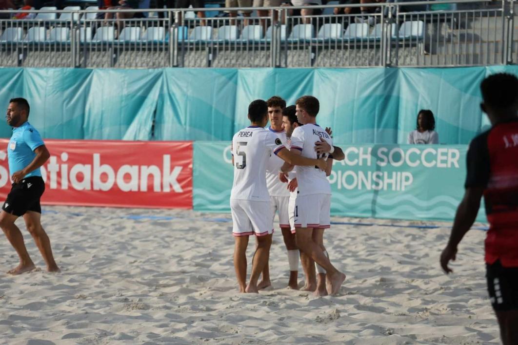 US Beach MNT players celebrate on the sand