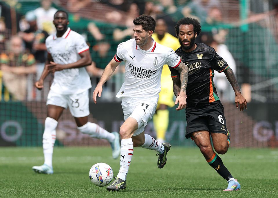 Christian Pulisic dribbles past defender