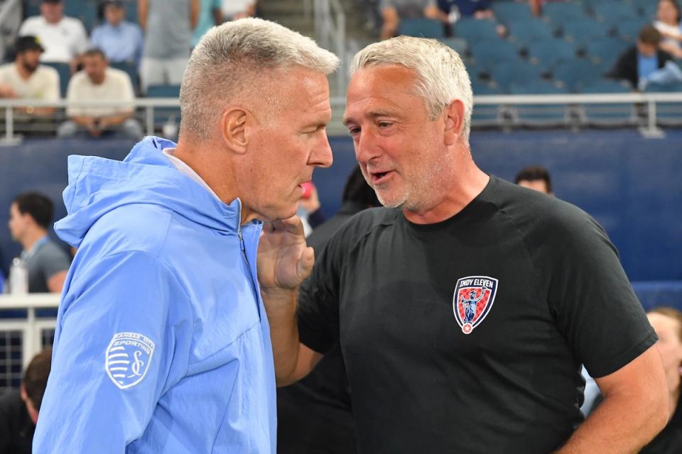 Sporting KC’s Peter Vermes (left) with Indy Eleven’s Sean McAuley before the 2014 Semifinal